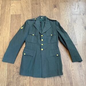 Vintage green Army military issue jacket with patches